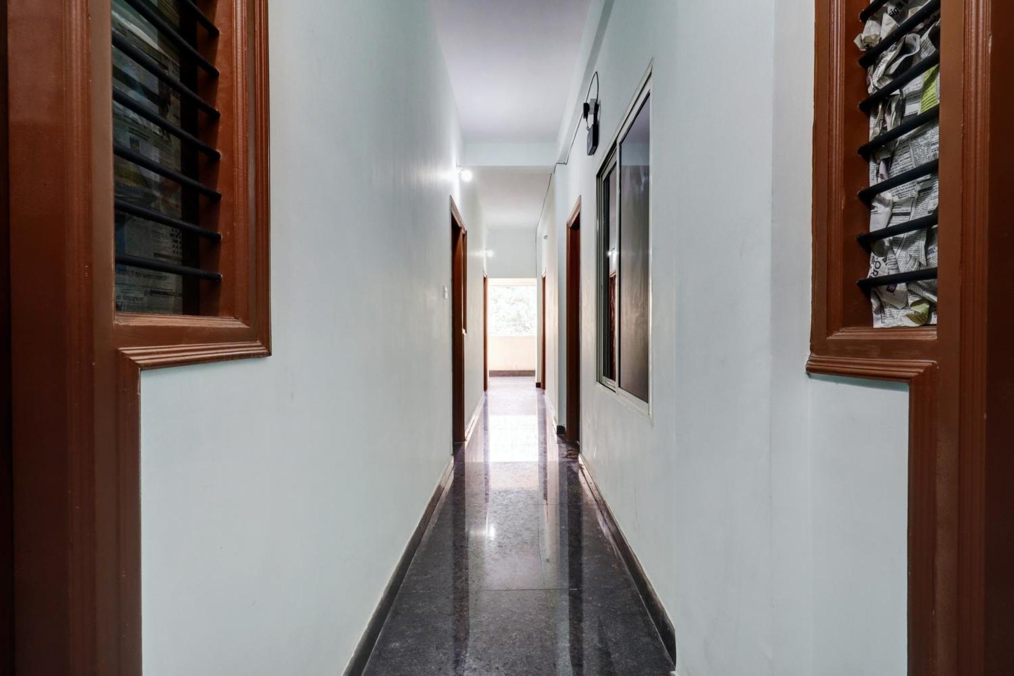 Super Hotel O Pm Hotels Bangalore Bagian luar foto